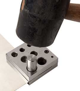 Rubber mallet over disc cutter